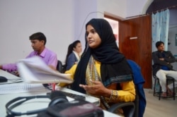 There are only three women among the employees at Radio Mewat. It's in a district where most women cannot work because of deep-seated patriarchal attitudes. (Anjana Pasricha/VOA)