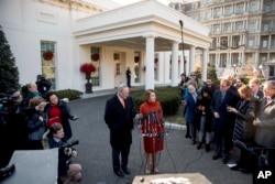 House Minority Leader Nancy Pelosi of Calif., right, accompanied by Senate Minority Leader Sen. Chuck Schumer of N.Y., left, speaks to members of the media outside the West Wing of the White House in Washington, Tuesday, Dec. 11, 2018, following a meeting with President Donald Trump.