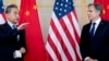 U.S. Secretary of State Antony Blinken, right, and China's Foreign Minister Wang Yi attend a meeting in Nusa Dua on the Indonesian resort island of Bali Saturday, July 9, 2022. 