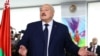 Belarusian President and presidential candidate Alexander Lukashenko visits a polling station during the presidential election in Minsk, Belarus Jan. 26, 2025.