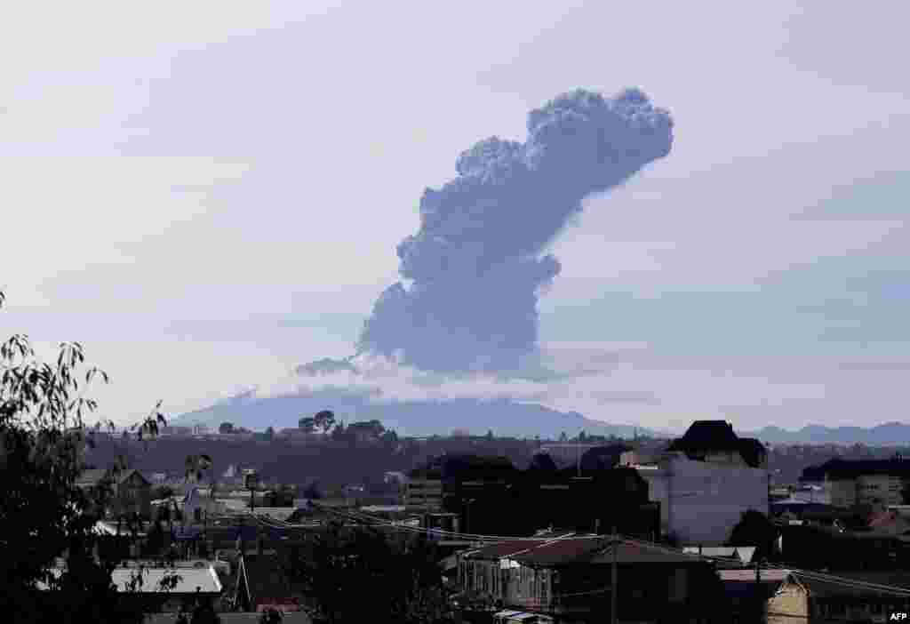 View of the Calbuco volcano from Puerto Montt, southern Chile. The volcano erupted again Thursday, releasing a large column of ash into the air just over a week after it spectacularly roared to life following half a century of inactivity.