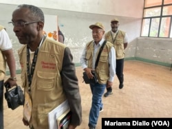 International election observers are seen at the Josina Machel secondary school in Maputo, Mozambique, Oct. 9, 2024.