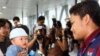 A baby arriving from Japan receives nuclear radiation detection from at Kuala Lumpur International Airport in Sepang, Malaysia.