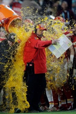 Kansas City Chiefs head coach Andy Reid is doused on the sideline during the second half of the NFL Super Bowl 54 football game against the San Francisco 49ers Sunday, Feb. 2, 2020, in Miami Gardens, Fla.