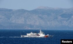 FILE - A Turkish coast guard ship patrols in the Aegean Sea, off the Turkish coast, April 20, 2016.