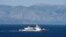 FILE -A Turkish coast guard ship patrols in the Aegean Sea, off the Turkish coast, April 20, 2016. 