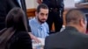 Hadi Matar, charged with severely injuring author Salman Rushdie in a 2022 knife attack, sits in Chautauqua County court before the start of jury selection in Mayville, New York, Feb. 4, 2025.