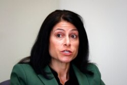 FILE - In this June 4, 2019, file photo, Michigan Attorney General Dana Nessel listens to a question from reporters in Detroit.