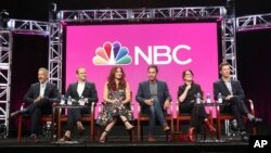 FILE - Co-creator/executive producers David Kohan, from left, and Max Mutchnick and actors Debra Messing, Eric McCormack, Megan Mullally and Sean Hayes participate in the "Will & Grace" panel during the NBC Television Critics Association Summer Press Tour at the Beverly Hilton in Beverly Hills, Calif., Aug. 3, 2017.