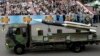 FILE – A model of Taiwan's indigenous Hsiung Feng III missile is displayed during National Day in Taipei, Oct. 10, 2007. At least two Taiwanese officers face charges in the July 1 misfiring of a supersonic missile that killed a fishing boat captain. 