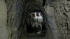 Afghan Special Forces inspect inside a cave which was used by suspected Islamic State militants at the site where a MOAB, or ''mother of all bombs'', struck the Achin district of the eastern province of Nangarhar, Afghanistan April 23, 2017. 