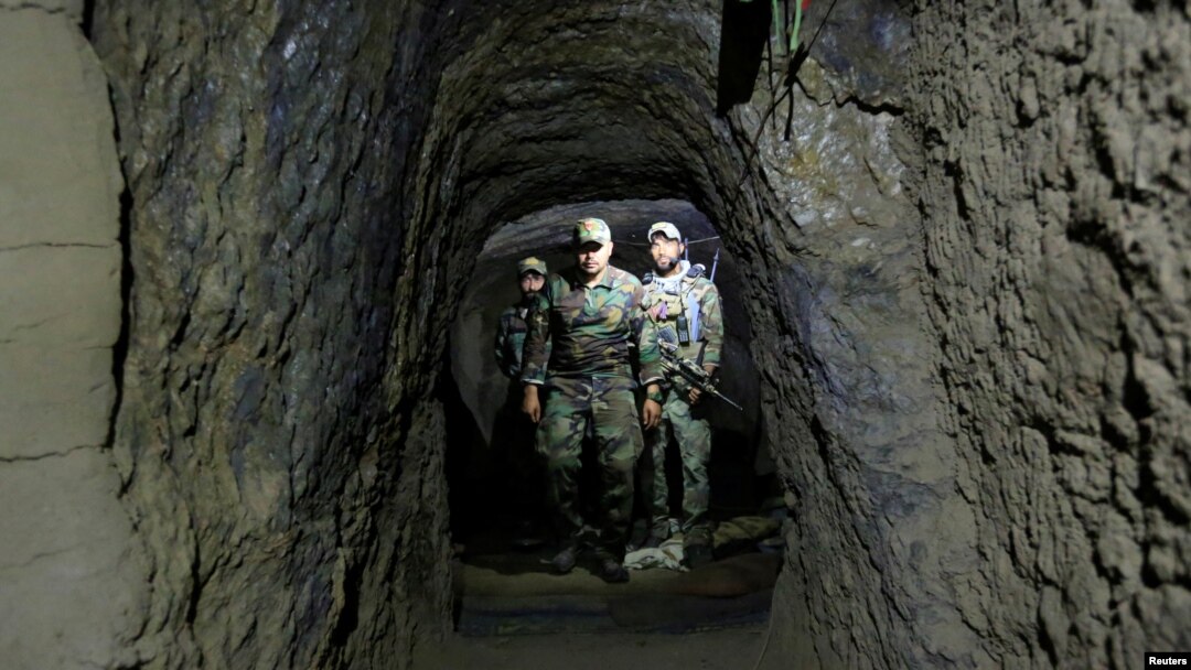 Afghan Special Forces inspect inside a cave which was used by suspected Islamic State militants at the site where a MOAB, or ''mother of all bombs'', struck the Achin district of the eastern province of Nangarhar, Afghanistan April 23, 2017. 