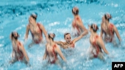 Team China competes in the team acrobatic routine of the artistic swimming event during the Paris 2024 Olympic Games at the Aquatics Centre in Saint-Denis, north of Paris, on Aug. 7, 2024. 