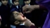 Ana ba wani yaro maganin rigakafin cutar Polio a birnin Lahore dake kasar Pakistan