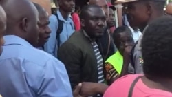 MDC Member, Policeman Arguing Over Crowd Control