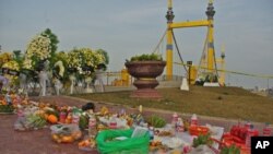 Cambodians have left traditional offerings at the foot of the Diamond bridge, the site of Phnom Penh's worst Water Festival stampede that took place on Monday November 22, 2010.