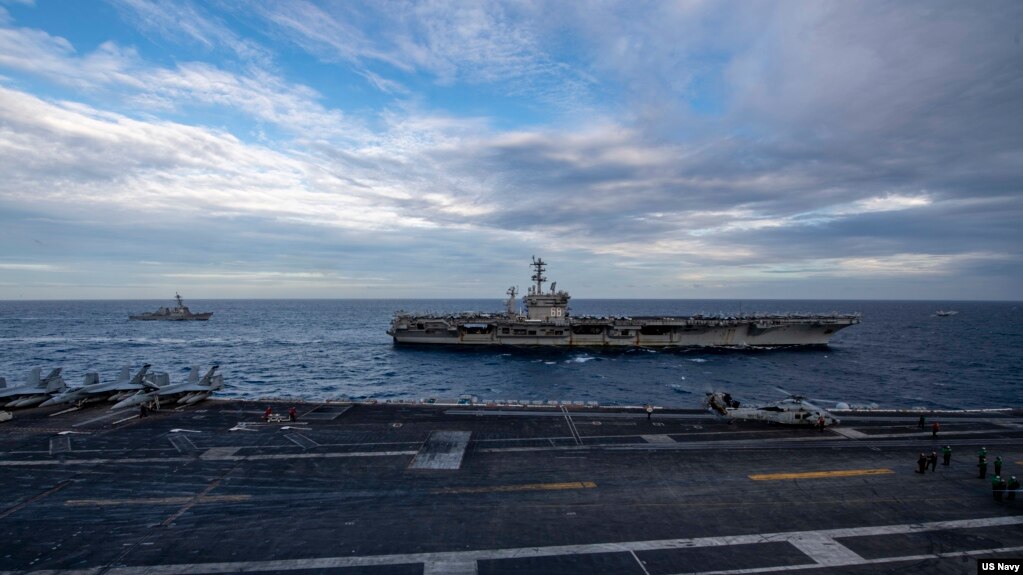 Theodore Roosevelt Carrier Strike Group và Nimitz Carrier Strike Group tại Biển Đông hôm 9 tháng Hai, 2021.