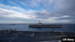 美軍羅斯福號航母(USS Theodore Roosevelt) 與尼米茲號(USS Nimitz)航母2021年2月9日在南中國海舉行雙航母聯演（美國海軍照片）