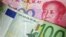 A 100 Euro banknote is placed on top of a 100 yuan banknote in this illustration taken in Beijing, November 7, 2010.