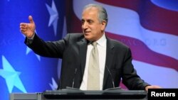 FILE - Zalmay Khalilzad, former U.S. ambassador to Afghanistan, Iraq and the United Nations, leads a panel discussion on Afghanistan at the Conservative Political Action conference (CPAC) in Washington, Feb. 12, 2011. 