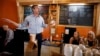 FILE - Democratic presidential candidate Beto O'Rourke speaks to local residents during a stop at the Central Park Coffee Company in Mount Pleasant, Iowa, March 15, 2019. 