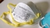 FILE - Michigan officials recently sent a cease-and-desist letter to a medical supply provider for selling N95 respirator masks, similar to those pictured, for $99.95 for a box of 10. The regular price was $15.