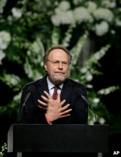 Comedian Billy Crystal delivers a eulogy during Muhammad Ali's memorial service in Louisville, Ky., June 10, 2016.