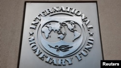 FILE - A view of the International Monetary Fund logo at its headquarters in Washington, Nov. 24, 2024. 