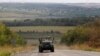 Ukrainian militaries drive out of Bakhmut, a war-affected area in eastern Ukraine, in Donetsk region, Sept. 5, 2022. 