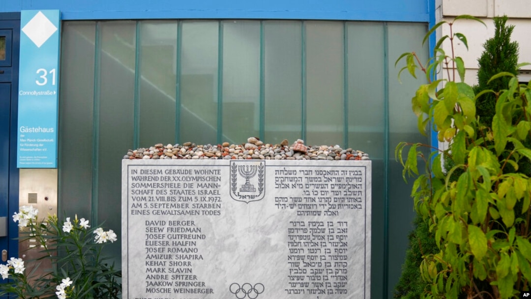 A memorial plaque for the 11 athletes from Israel and one German police officer killed in a terrorist attack during the 1972 Olympic Games stands at the former accommodation of the Israeli team in the Olympic village in Munich, Germany, Aug. 27, 2022.