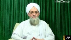 This still image from video obtained courtesy of a group called "IntelCenter," showing Al-Qaeda leader Ayman al-Zawahiri appearing in a new video released, October 11, 2011.