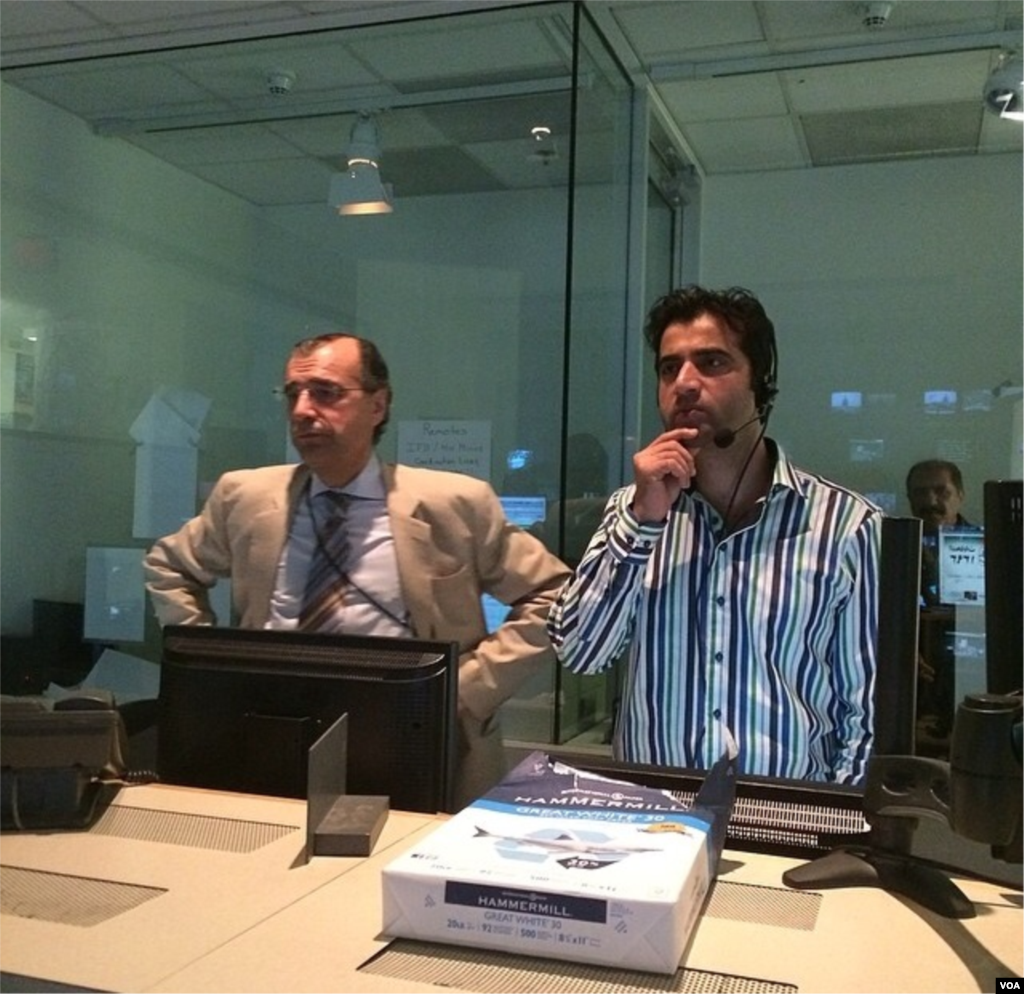 TV Ashna’s Managing Editor Ahad Azizzada and Line Producer Abdullah Orokzai in Control Room 51 during a live show.
