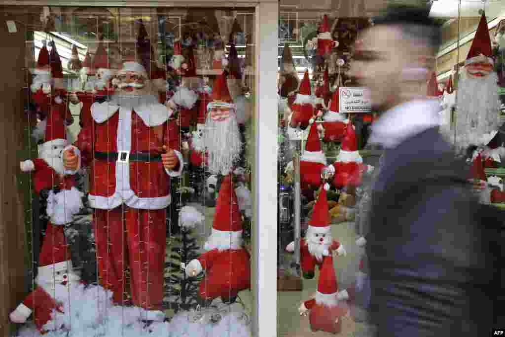Christmas decorations are seen in a window in Gaza City.