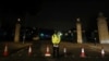 A police officer stands guard after police arrested a man carrying a knife outside Buckingham Palace in London, Britain, Aug. 25, 2017.