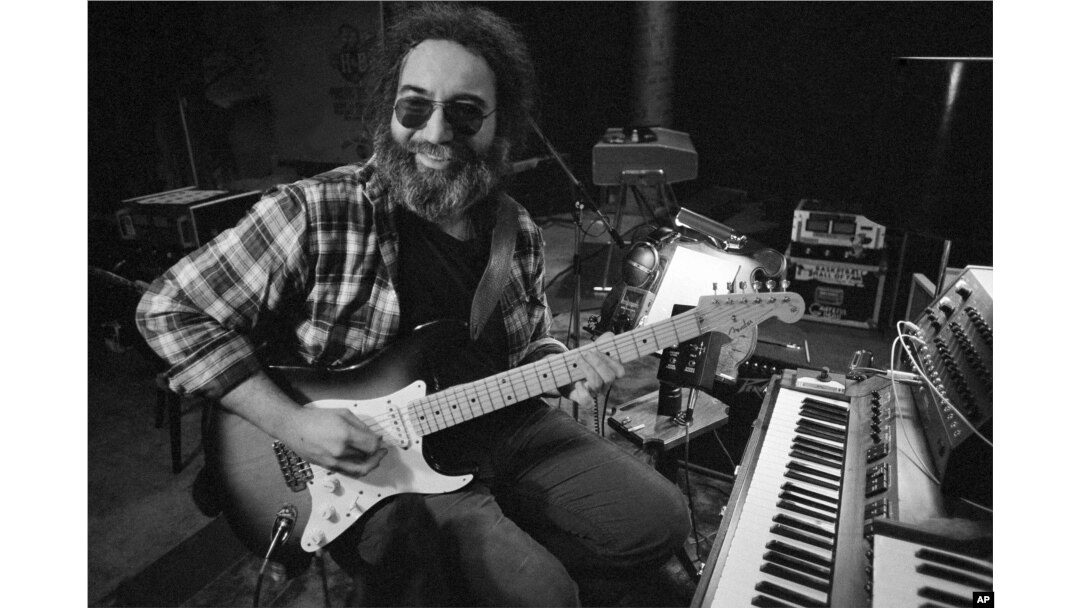 Jerry Garcia, leader of the legendary group,The Grateful Dead, works with his guitar, May 8, 1979.