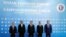 From left, Azeri Prime Minister Mammadov, Iranian Vice President Jahangiri, Turkmen President Berdimuhamedov, Russian Prime Minister Medvedev and Kazakh Prime Minister Mamin pose for a photo during the First Caspian Economic Forum in Turkmenbashi.
