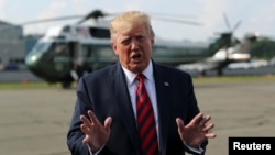 U.S. President Donald Trump speaks to reporters before boarding Air Force One to return to Washington from Morristown Municipal Airport in Morristown, New Jersey U.S. August 18, 2019. REUTERS