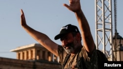 Armenian opposition leader Nikol Pashinyan waves to his supporters at a rally in Yerevan, Armenia, May 2, 2018. 