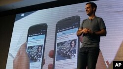 Hugo Barra, product management director of Android at Google, introduces the Android beam function of the new Galaxy Nexus smartphone during the news conference in Hong Kong, October 19, 2011.
