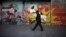 A man walks by a commercial area of closed shops during a government-ordered lockdown to curb the spread of the new coronavirus in Buenos Aires, Argentina, June 26, 2020.