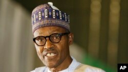 FILE - Nigerian President-elect Muhammadu Buhari speaks moments after he was presented with a certificate to show he won the election in Abuja, April 1, 2015.