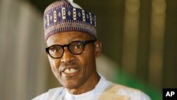 FILE - Nigerian former General Muhammadu Buhari speaks moments after he was presented with a certificate to show he won the election in Abuja, Nigeria, April 1, 2015. 