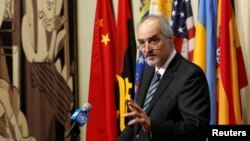 FILE - Syrian Ambassador to the United Nations Bashar al-Jaafari addresses the media following a United Nations Security Council vote aimed at ensuring that U.N. officials can monitor evacuations from besieged parts of the Syrian city of Aleppo, at the United Nations in Manhattan, New York City, Dec. 19, 2016.