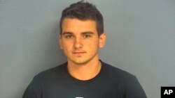 Dmitriy Andreychenko, 20, panicked shoppers fled a Walmart in Springfield, Missouri, after Andreychenko, carrying a rifle and wearing body armor walked around the store.