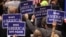 Delegates hold signs during speeches at the Republican National Convention, Cleveland, Ohio, July 18, 2016. 