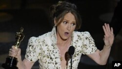 Melissa Leo accepts the Oscar for best actress in a supporting role for "The Fighter" at the 83rd Academy Awards on Sunday, Feb. 27, 2011, in the Hollywood section of Los Angeles.