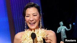 Michelle Yeoh accepts the Outstanding Performance by a Female Actor in a Leading Role award for "Everything Everywhere All at Once" during the 29th Screen Actors Guild Awards in Los Angeles, California, Feb. 26, 2023.