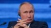 Putin Policy "Threatening" - Analysts