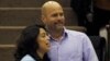 Gerardo Hernandez, one of so-called "Cuban Five," hugs his wife Adriana Perez during the National Assembly in Havana, Dec. 20, 2014.