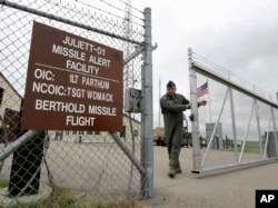 FILE - A gate is closed at an ICBM launch control facility in the countryside outside Minot, North Dakota, on the Minot Air Force Base, June 24, 2014.